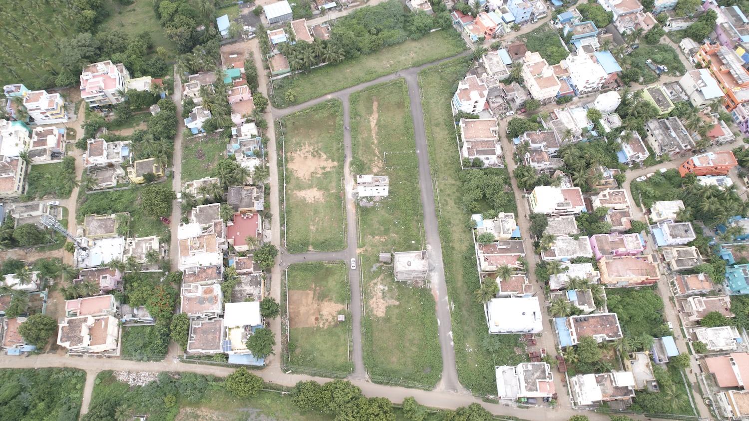 04 drone view top - CMDA Plots on NH45 in Vandalur - Perungalathur