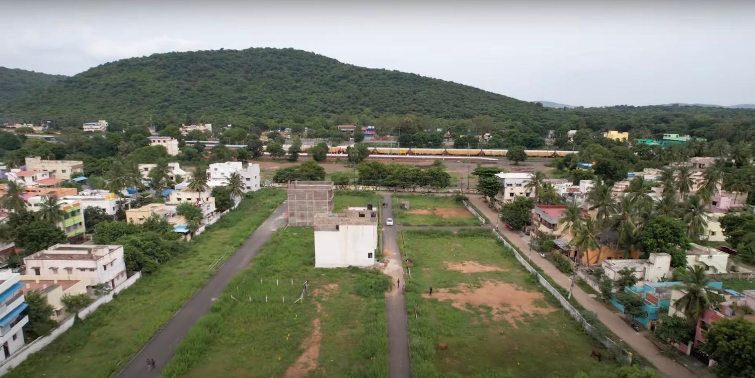 02 drone view front - CMDA Plots on NH45 in Vandalur - Perungalathur