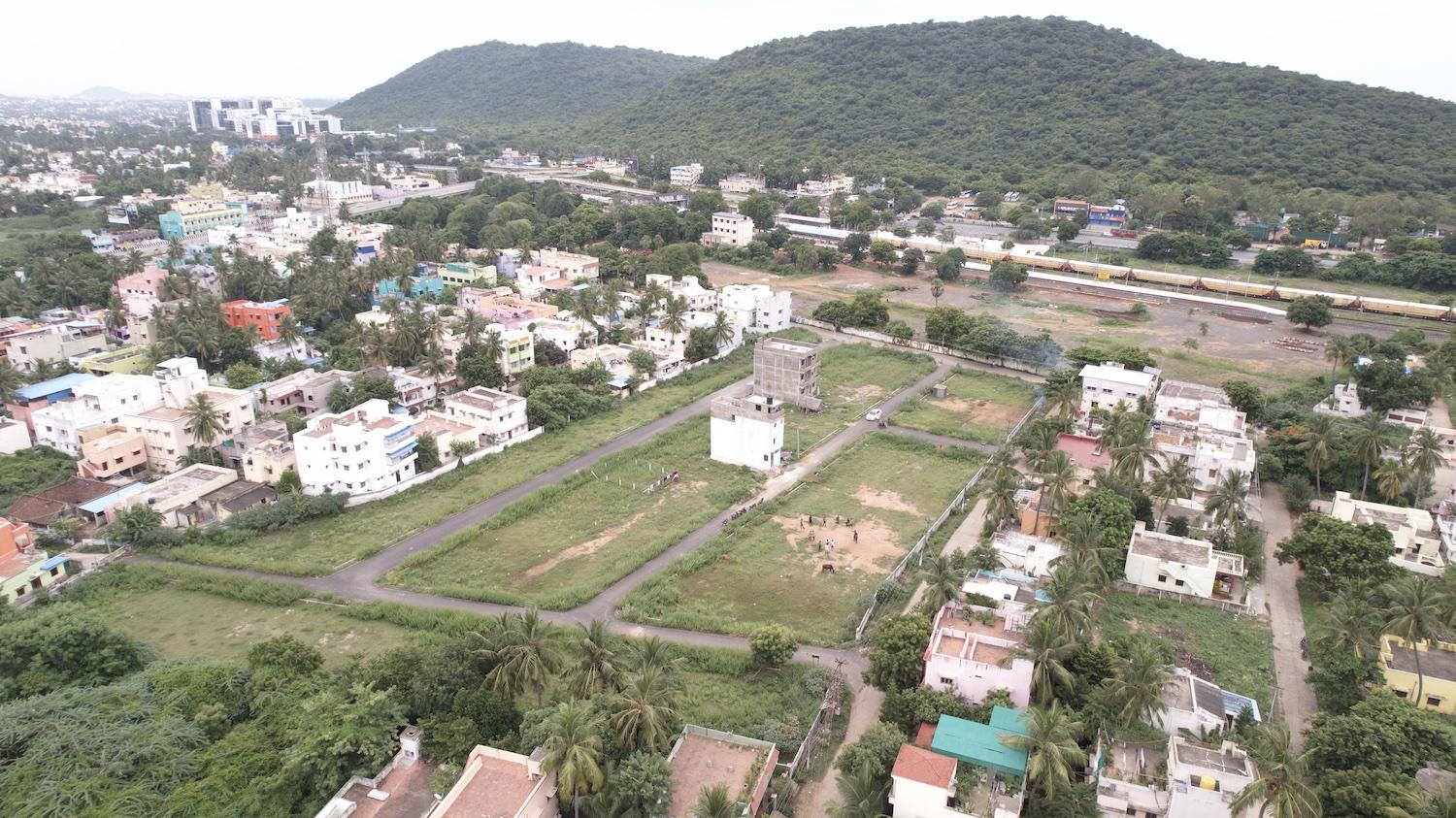 03 drone view side 2 - CMDA Plots on NH45 in Vandalur - Perungalathur